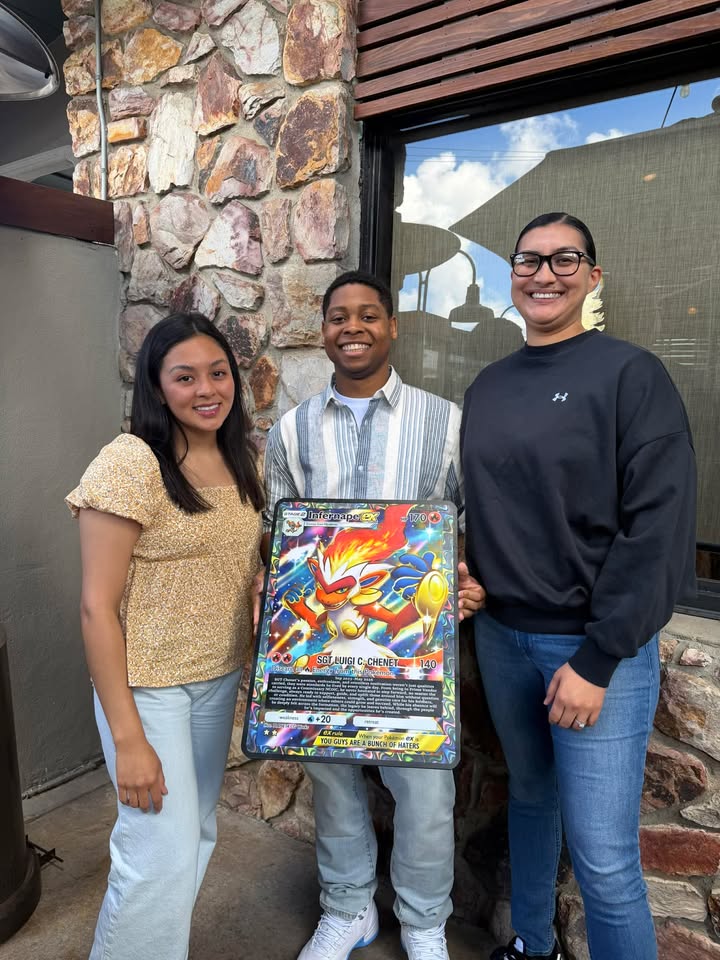 Three customers with a custom trading-card plaque