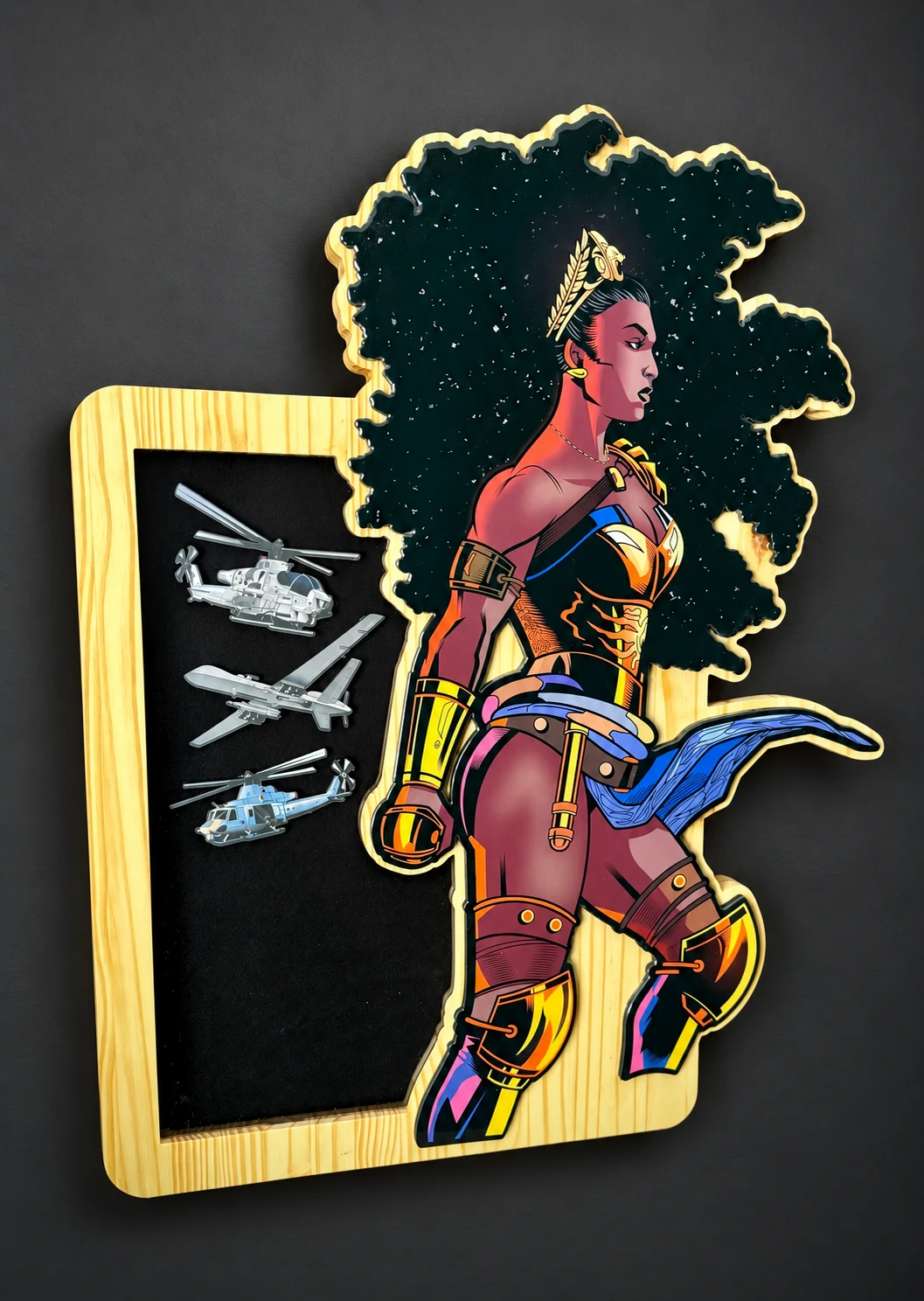 Armored heroine shadow box with three aircraft emblems