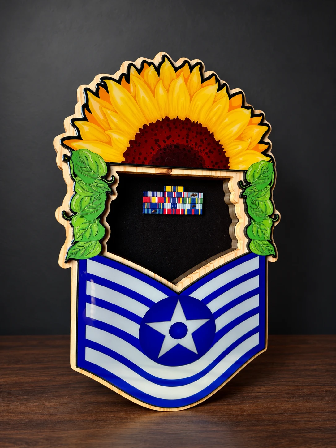 Sunflower shadow box with a blue and white Air Force rank design and ribbons