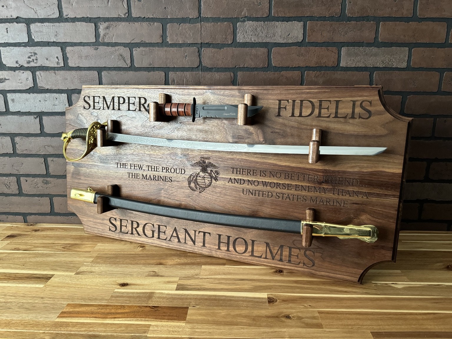 Personalized wooden Marine Corps sword display with a mounted sword, scabbard, and K-Bar